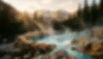 Steaming geothermal hot springs near Boulder CO surrounded by mountains and natural stone formations at sunset