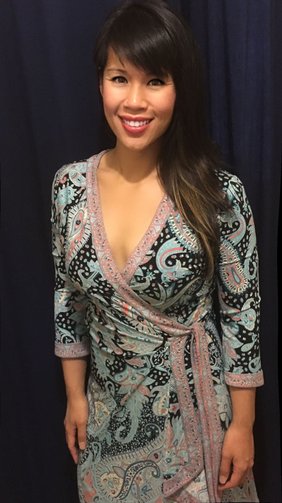 Kat wearing a wrap dress to balance and define the bust