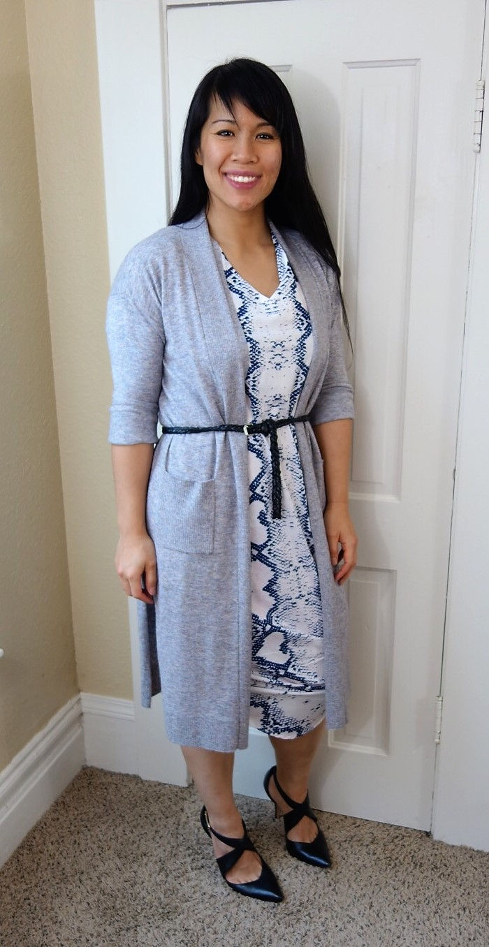 Kat wearing snakeskin dress