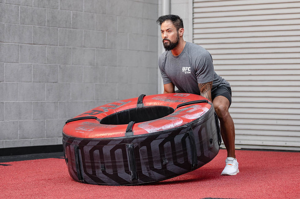Man doing tyre flips
