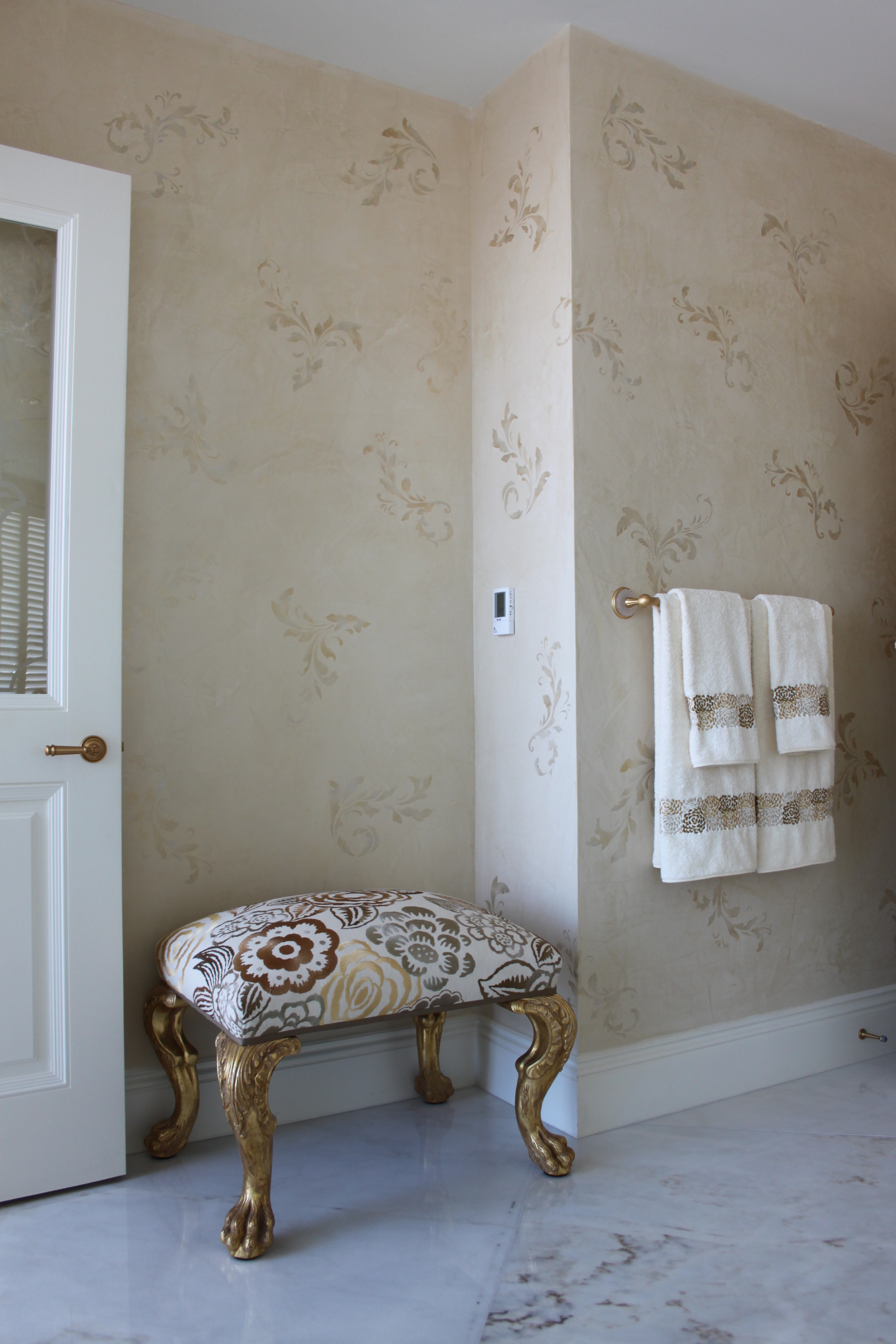 Metallic stencilled venetian plaster