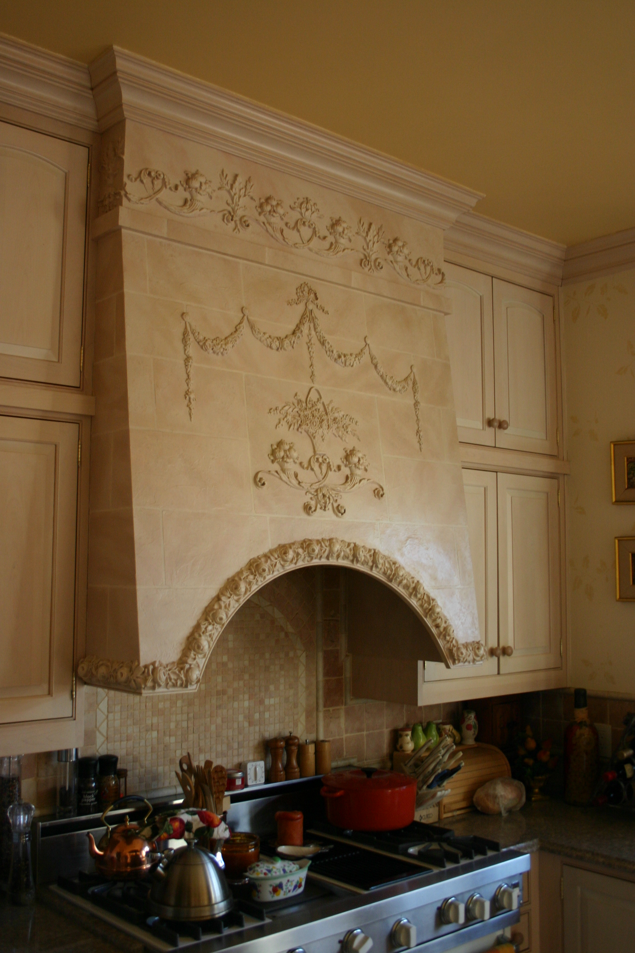 Composition ornament on hood