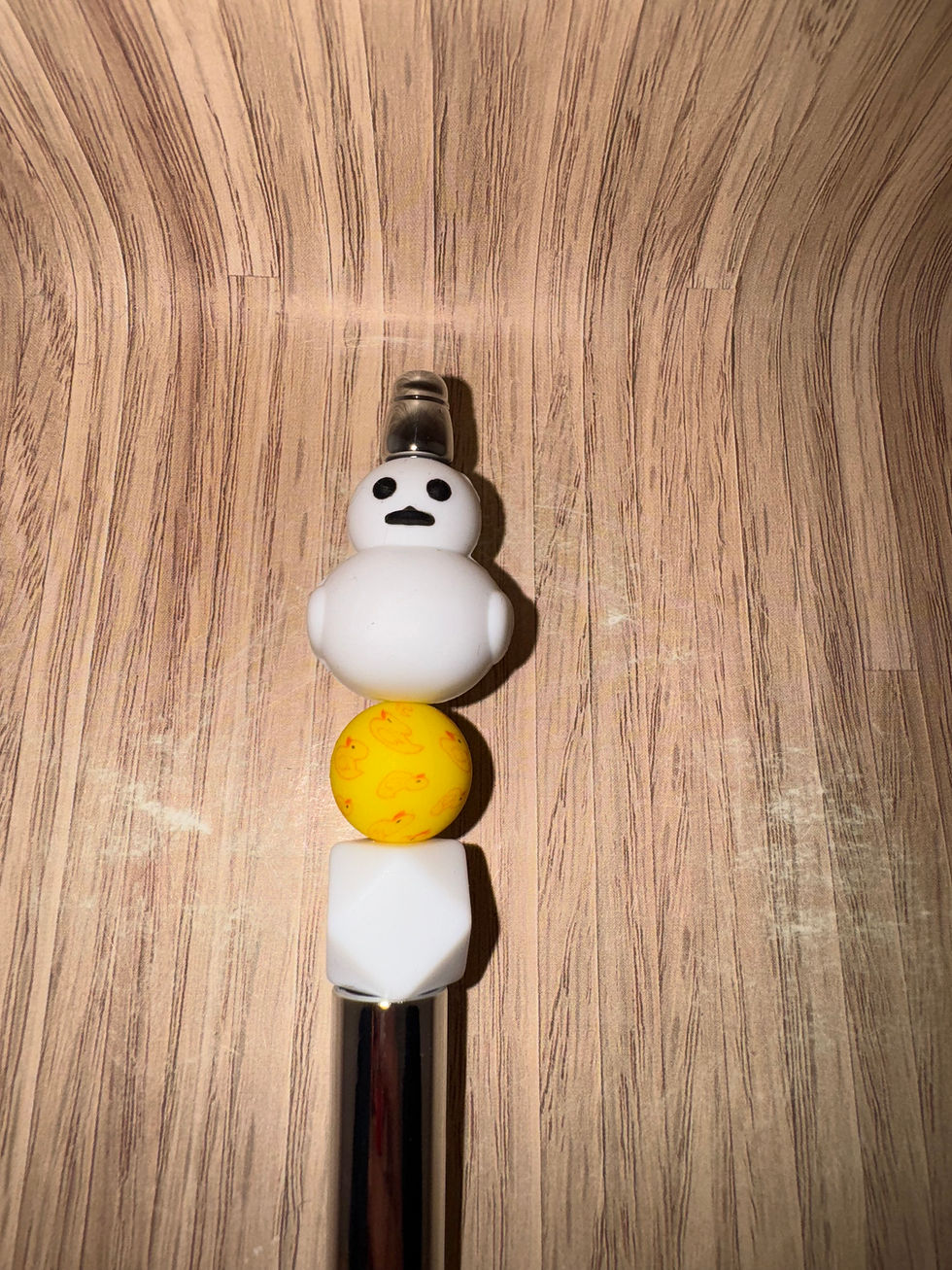 White duck pen charm with yellow accents