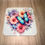 Thumbnail: Colourful butterfly heart drinks coaster