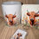 Thumbnail: Highland cow mug, coaster, and keychain gift set