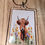 Thumbnail: Spring time highland cow keyring