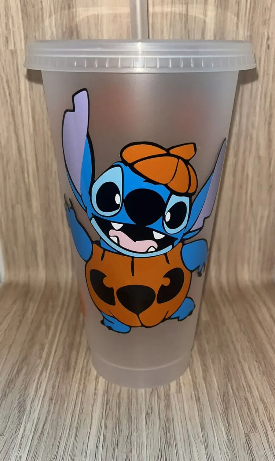 Stitch in pumpkin costume on tumbler