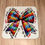 Thumbnail: Colourful puzzle-piece bow; Autism awareness coaster