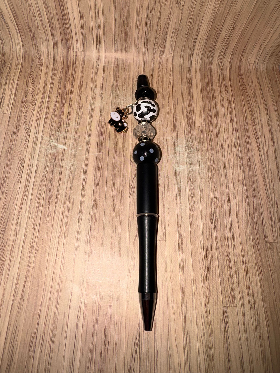 black cow beaded pen
