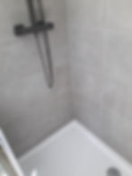 Wall tiling in a shower in Allington