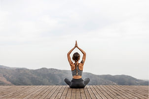 back-view-woman-doing-yoga-outdoors.jpg
