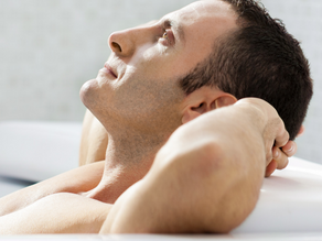 Considering a bathroom remodel? This relaxation moment highlights the potential tranquility of newly renovated spaces, inviting you to ponder if a permit is needed for your project.