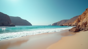 The image shows a pristine beach with calm, turquoise water lapping gently onto the pale sand, framed by dramatic, reddish-brown cliffs under a clear blue sky.
