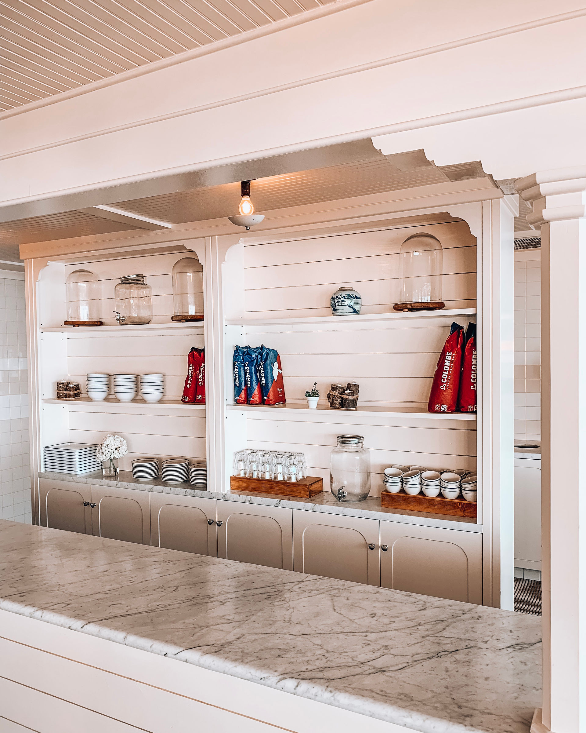 Coffee bar at Sound View Greenport with La Colombe bags.