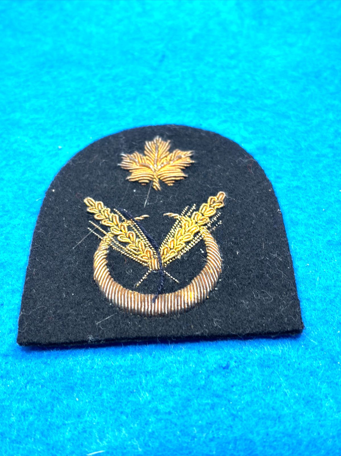 RCN 1953-68 Trade Badges Cook bullion wire on blue