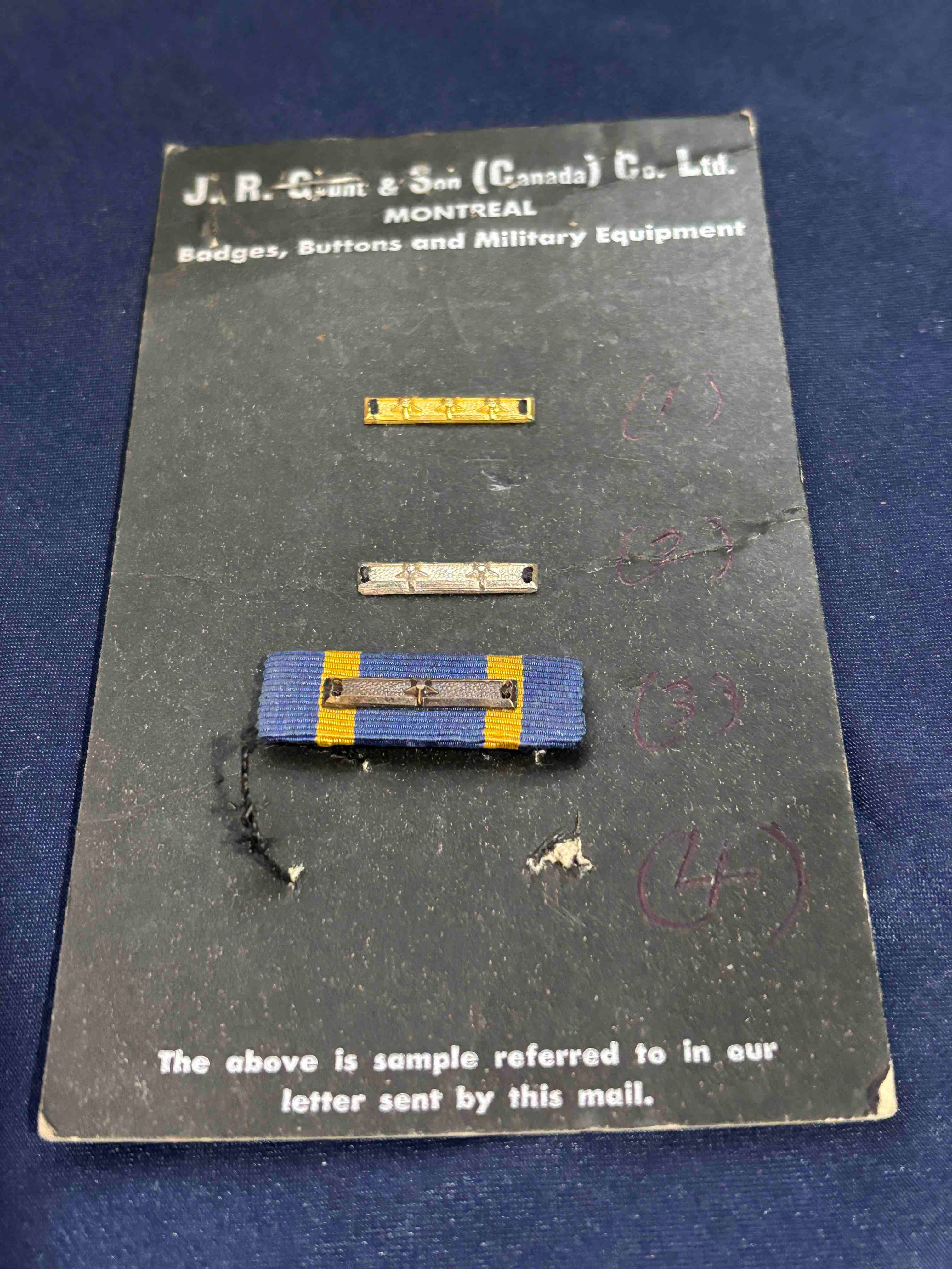 Royal Canadian Mounted Police Long Service Ribbon and bars are maker card Gaunt