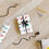Thumbnail: sustainably sourced premium gift wrap with acoustic guitar music graphic by Nat-Ts