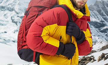mountaineer-in-winter-clothes-with-hikin