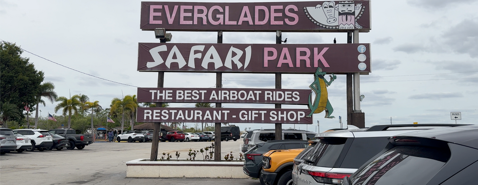 Entrance sign for the Everglades Safari Park advertising the Best Airboat Rides