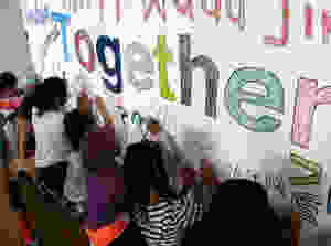 Together mural making at SWB Oakland.jpeg
