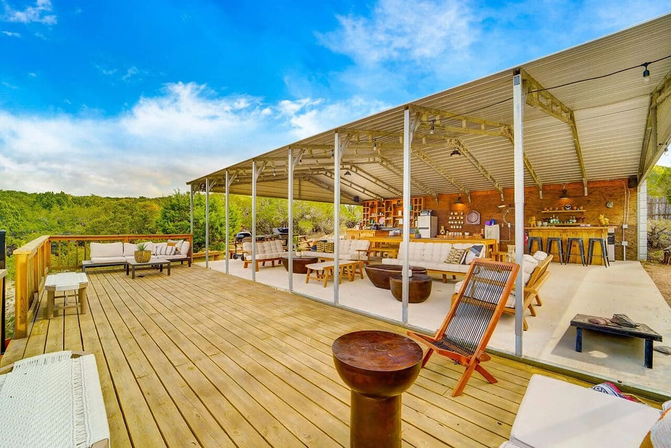 La Fortuna’s outdoor patio featuring comfortable seating, a pool table, and games, ideal for fun and casual events.