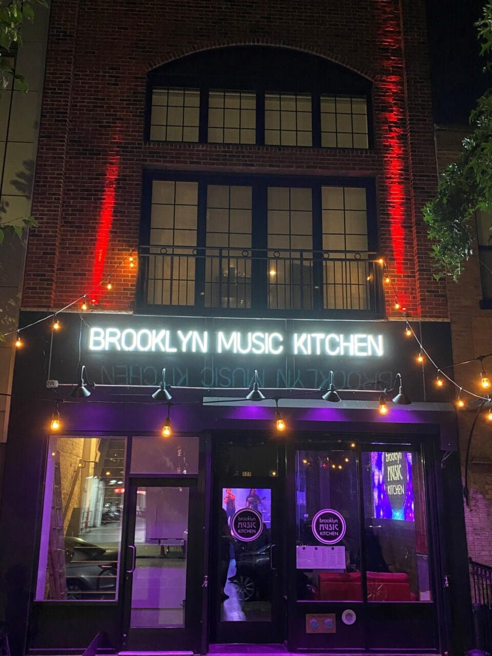 Intimate, music-filled atmosphere at Brooklyn Music Kitchen with live performance space, soul food, and a casual vibe for parties.