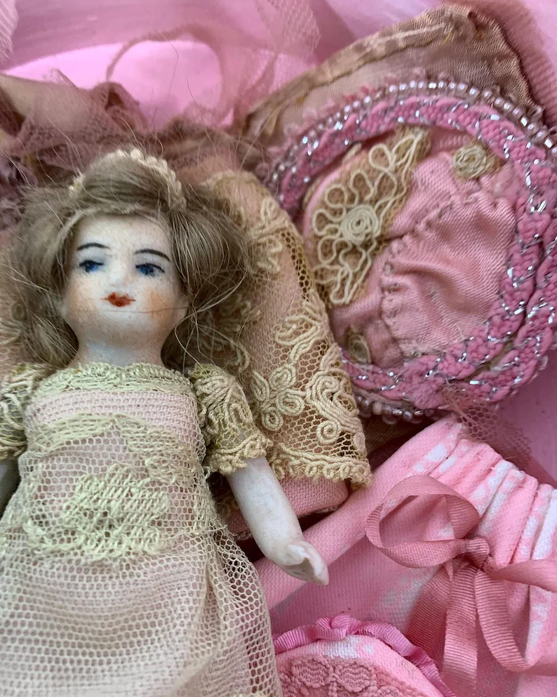 Thumbnail: Antique stunning China doll complete with change of outfits