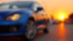 vecteezy_blue-car-parked-during-golden-hour-on-street-with-sunset-and_68851017.jpeg