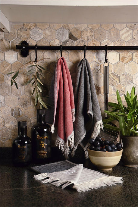 Aegean Breeze Napkins beautiful, colorful, and reversible hanging on the kitchen counter