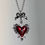 Thumbnail: Cross inside heart pendant