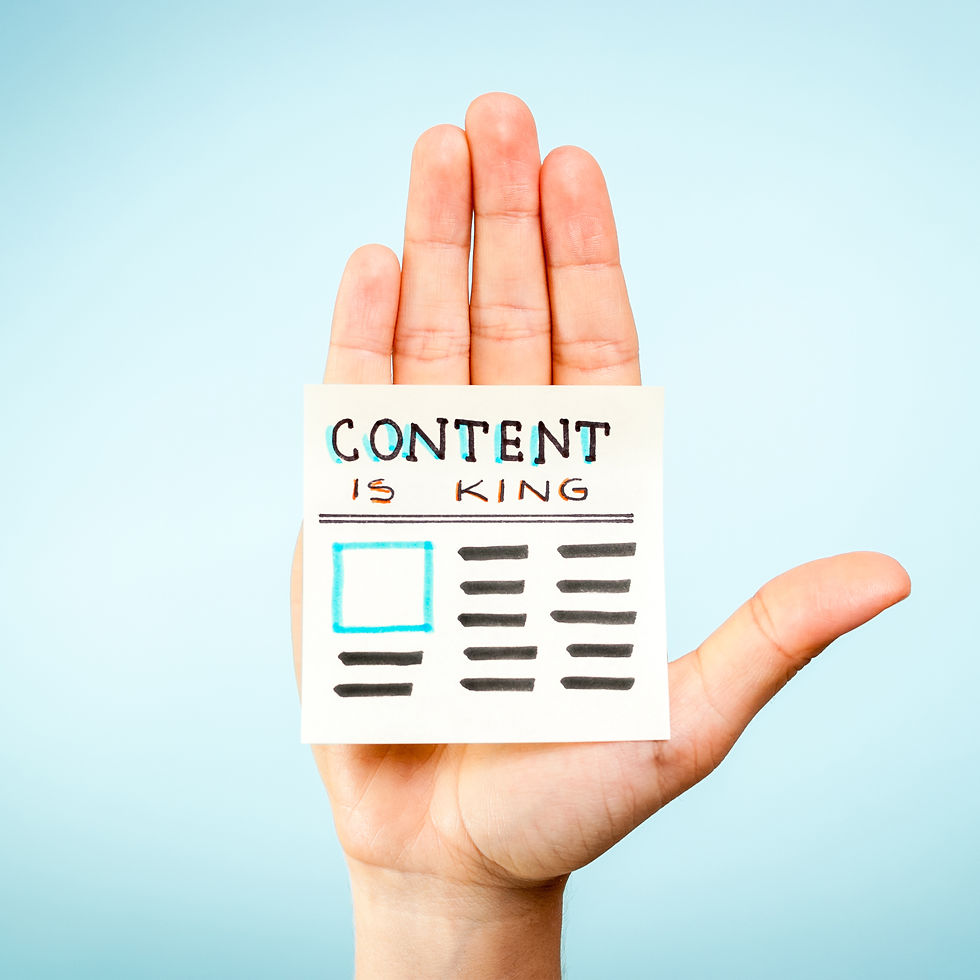 hand showing an image saying that content is king