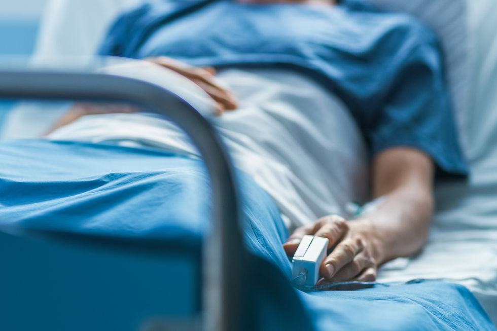 sick man lying on bed