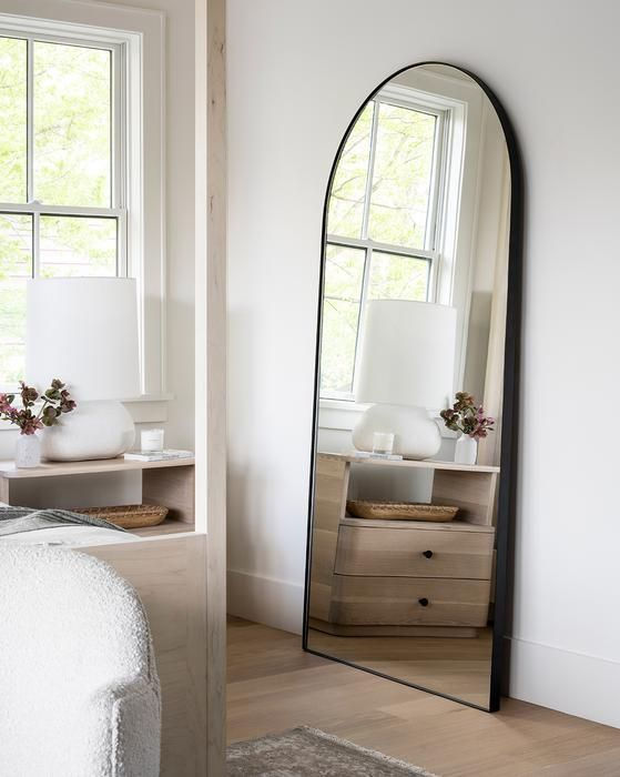 Gala Floor Mirror by McGee & Co. arched floor mirror in bedroom