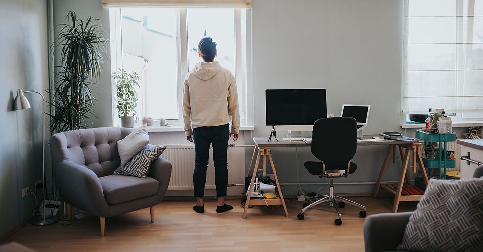 Worker feeling isolated, a common remote work challenge.