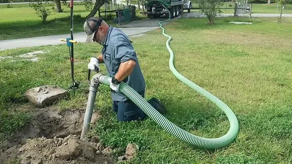 Technicians and staff showcasing septic service careers opportunities