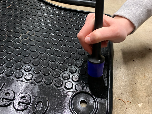 brush cleaning floor mats