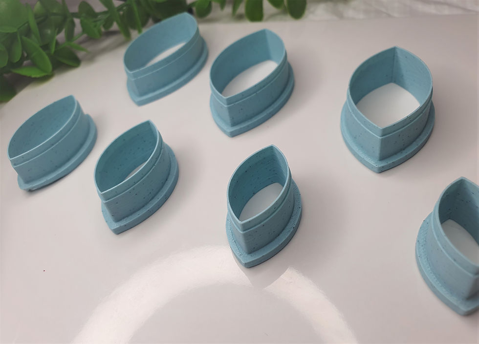 Thumbnail: Leaf polymer clay cutters in multiple sizes, side view, 3D printed geometric cutters for clay crafts