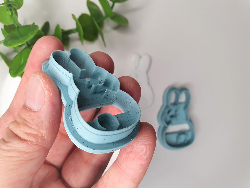 Thumbnail: Bunny body polymer clay cutter shown in hand, side view, lightweight 3D printed tool for precise clay cutting