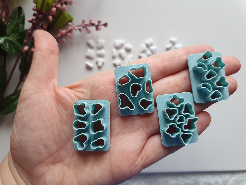 Thumbnail: Cow Pattern polymer clay cutter shown in hand, lightweight 3D printed tool for precise clay cutting