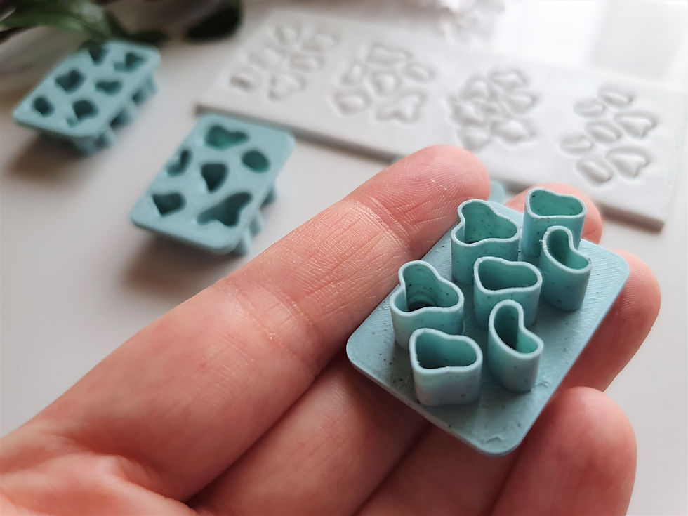 Thumbnail: Cow Pattern polymer clay cutter shown in hand, side view, lightweight 3D printed tool for precise clay cutting