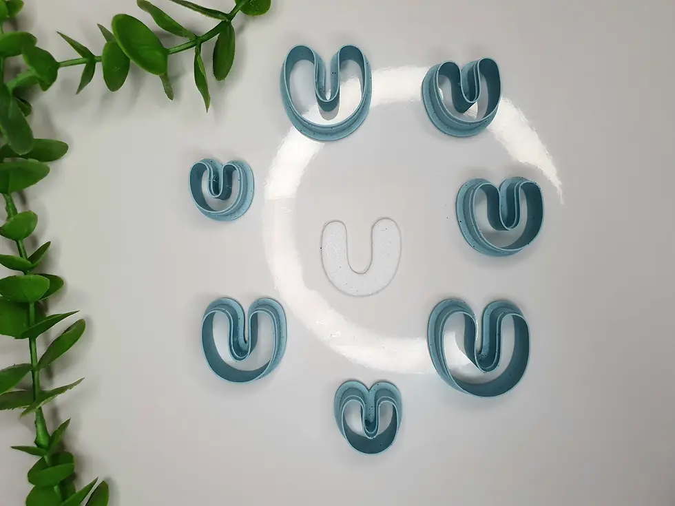 Thumbnail: Organic Arch polymer clay cutters in multiple sizes, front view, 3D printed cutters for clay crafts