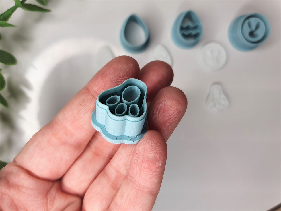 Thumbnail: Close up of an Easter footprint polymer clay cutter shown in hand, lightweight 3D printed tool for precise clay cutting