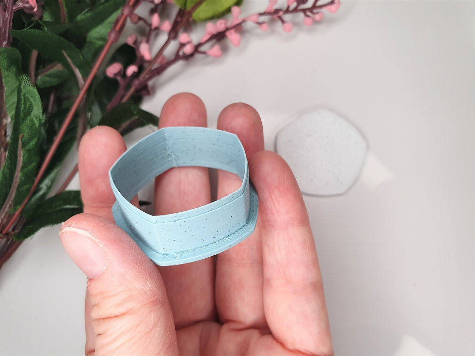 Thumbnail: Pentagon polymer clay cutter shown in hand, side view, lightweight 3D printed tool for precise clay cutting