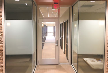 interior monolithic glass and interior storefront