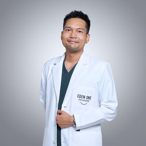Male doctor on white backdrop at LPS Headshot Studio central Bangkok