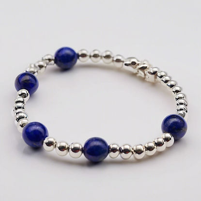 elegant lapis blue bead and white cat-eye bead_edited.jpg