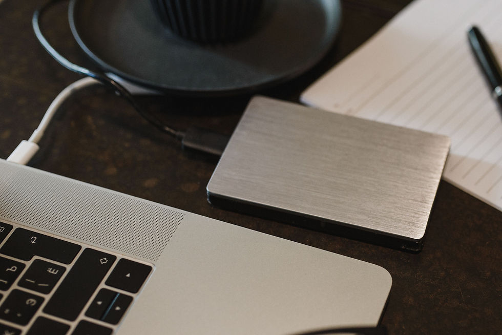 Portable drive connected to a laptop during a cloud data export