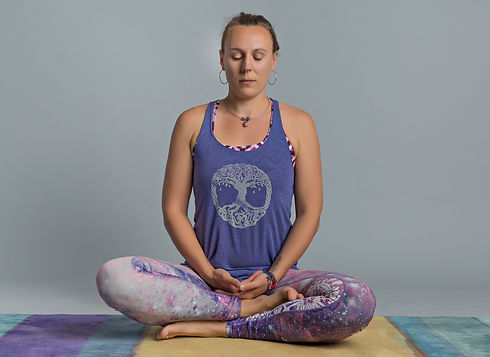 Kirstin in a seated meditation pose