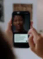 phone in hand mockup1.webp