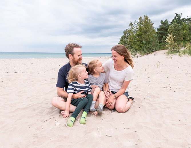 Photo of family with two boys on the beach in Kincardine
